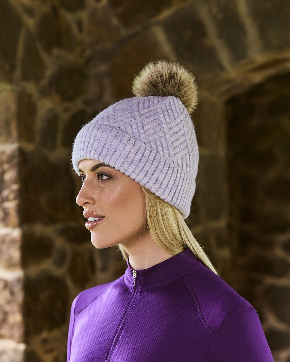 Purple Marle coloured Dublin Bea Beanie on stone wall background