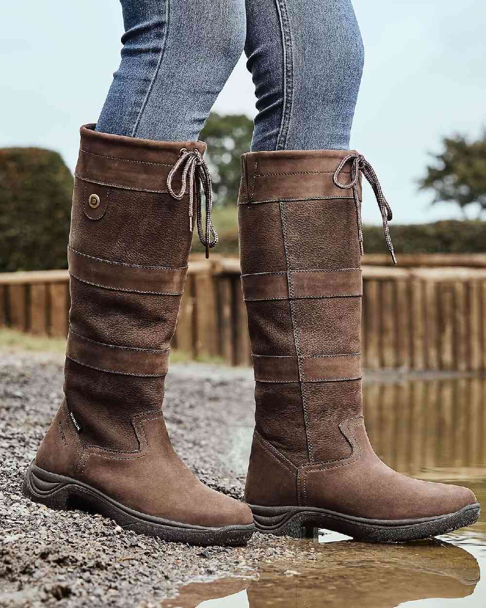Chocolate coloured Dublin River Boots III on water background