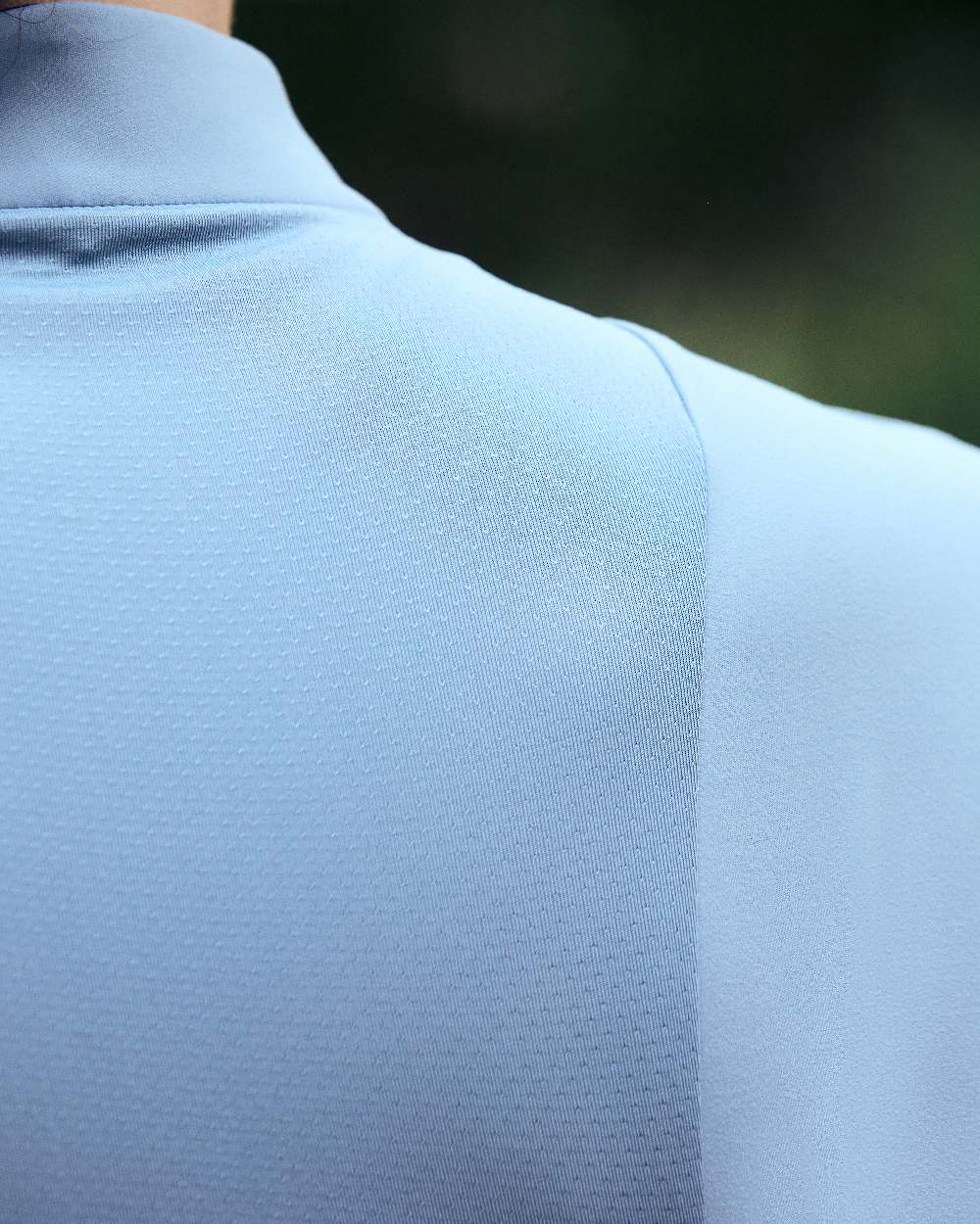 Blue Fog coloured Dublin Womens Brushed Long Sleeve Riding Top on blurry background