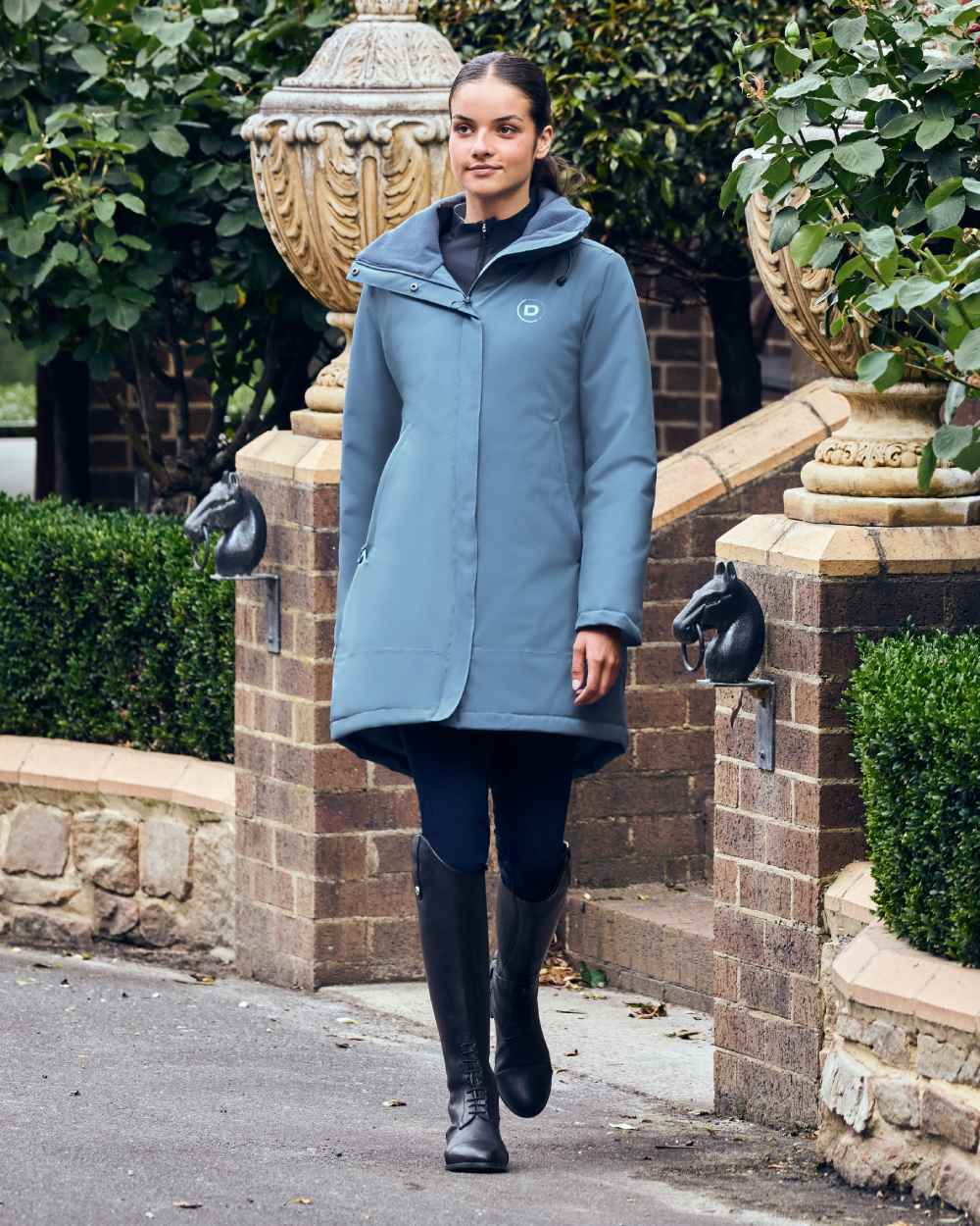 Denim coloured Dublin Womens Everyday Waterproof Jacket on garden background