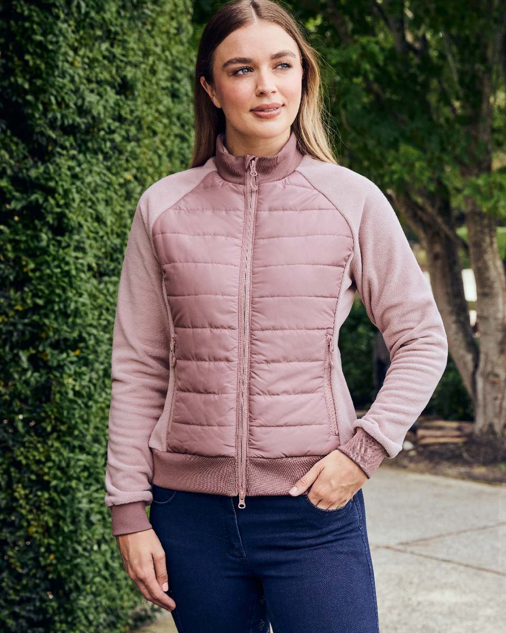 Dusty Rose coloured Dublin Womens Insulated Hybrid Jacket on garden background