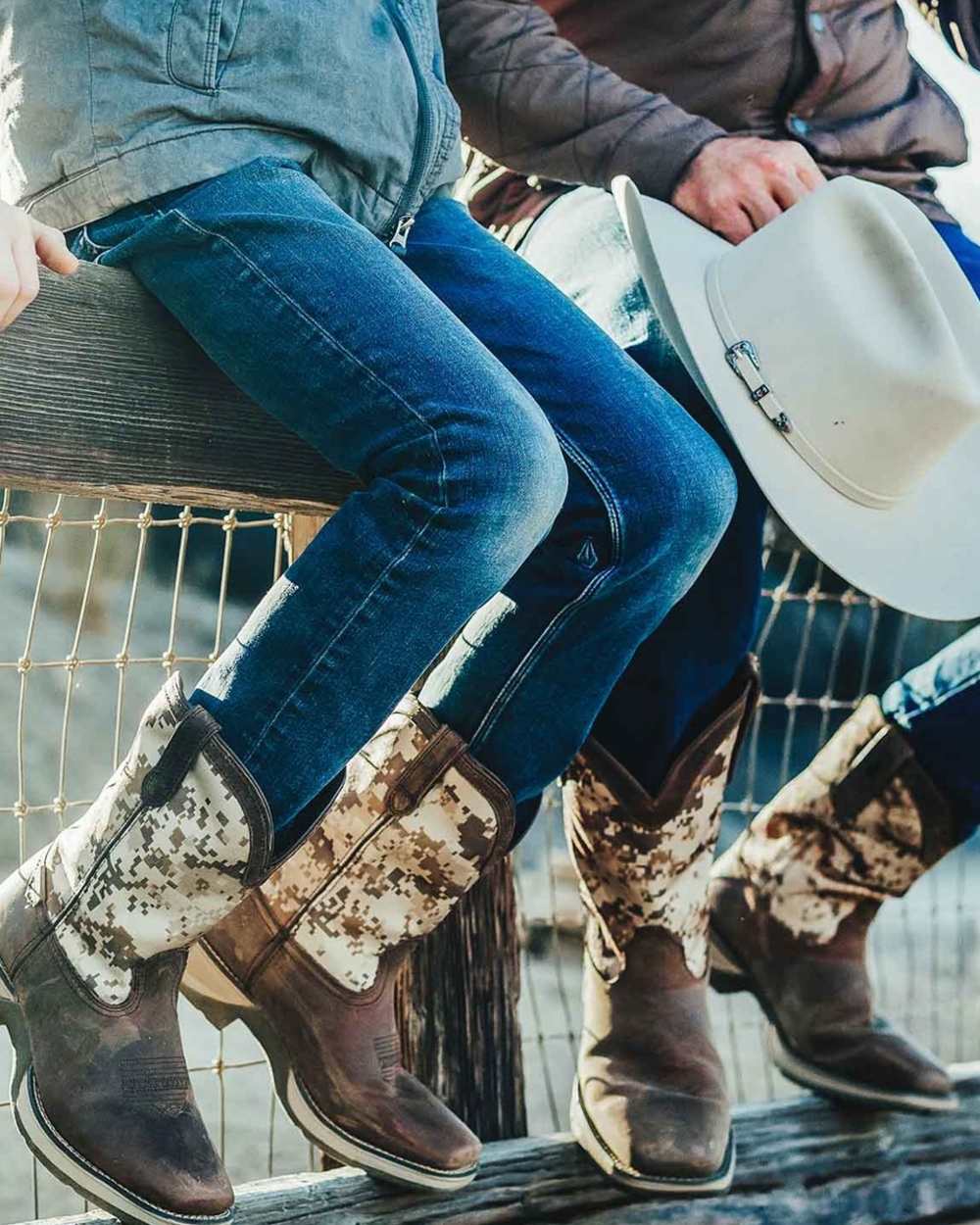 Dusty Brown Desert Camo coloured Durango Mens Rebel Desert Camo Pull-On Western Boots on outdoor background