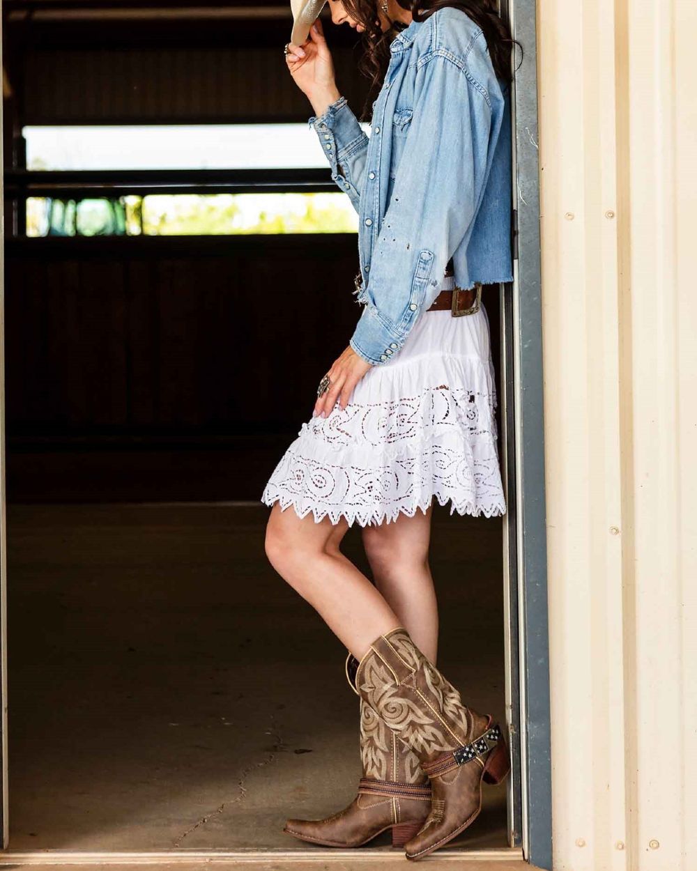 Brown Khaki coloured Durango Womens Crush Flag Western Boots on outdoor background