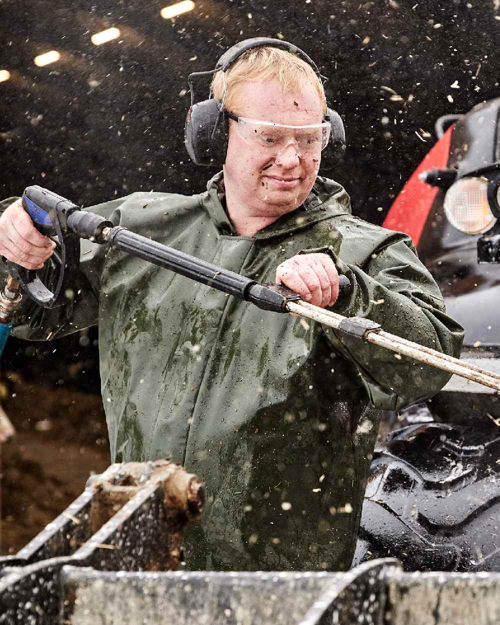 Olive Coloured Elka Light Jacket on construction background