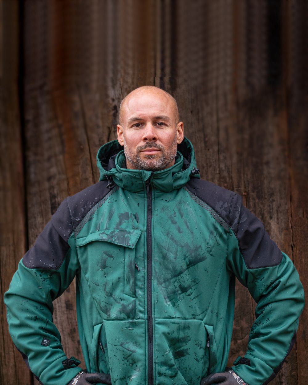 Green Black Coloured Elka Mens Working Xtreme Winter Softshell Jacket on blurry background