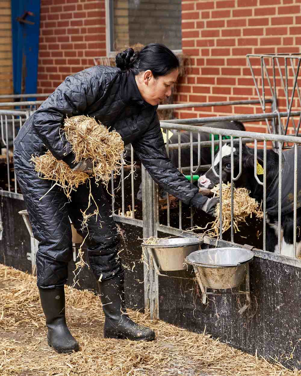 Black Coloured Elka Womens Thermal Trousers on barn background