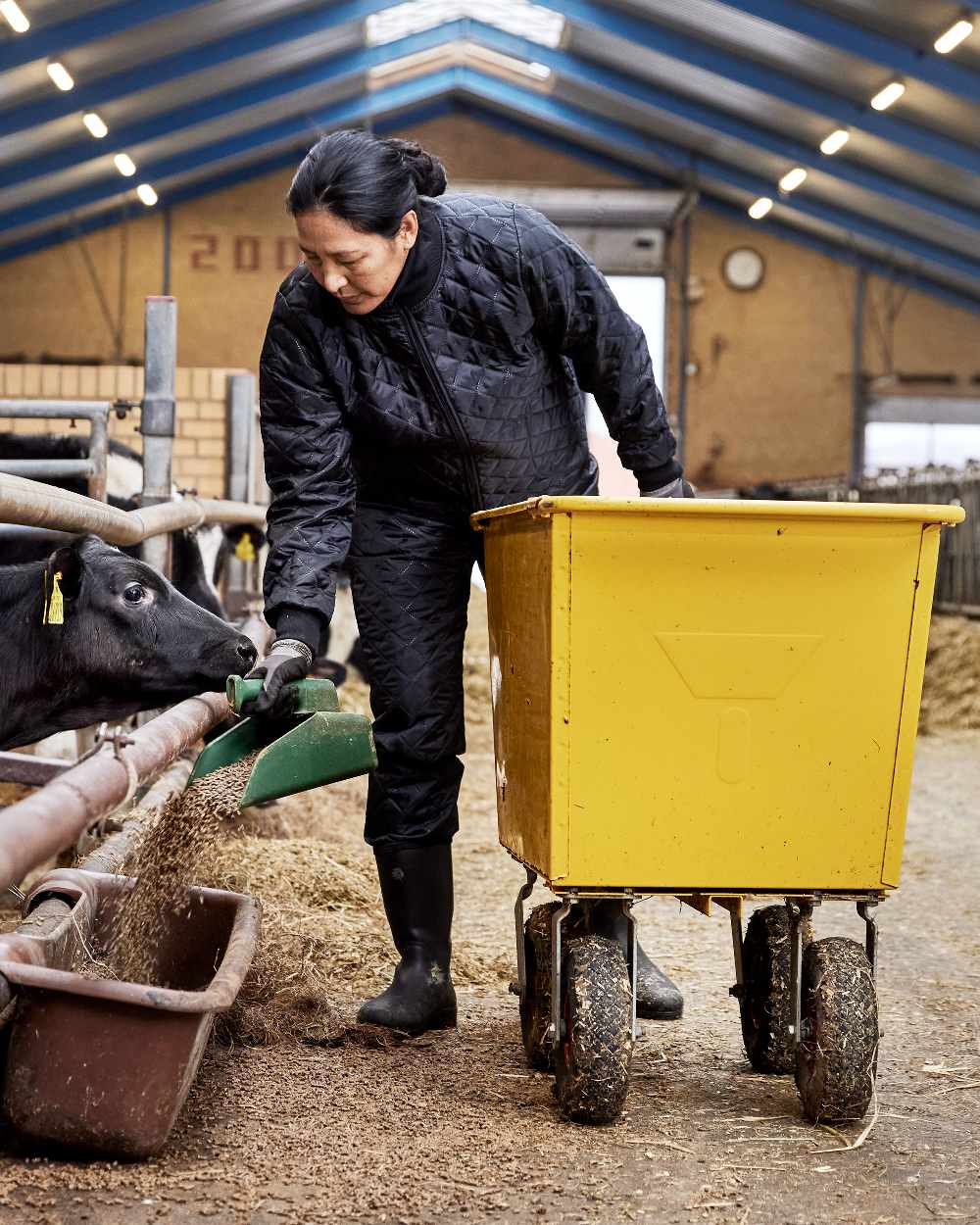 Black Coloured Elka Womens Thermal Trousers on barn background