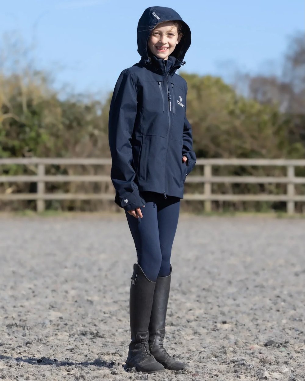 Navy Equidry Childrens Varsha Waterproof Jacket on outdoor background