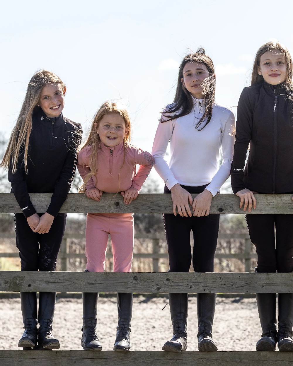 Pale Pink Grey Coloured Equidry Childrens Water Repellent Base Layer on outdoor background