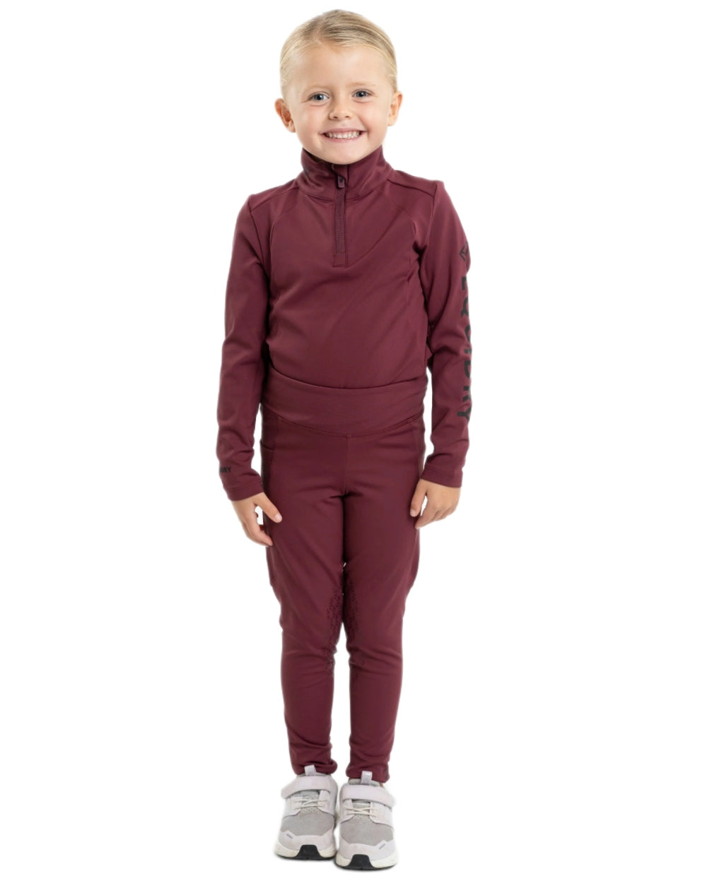 Plum Black Coloured Equidry Childrens Water Repellent Base Layer on white background