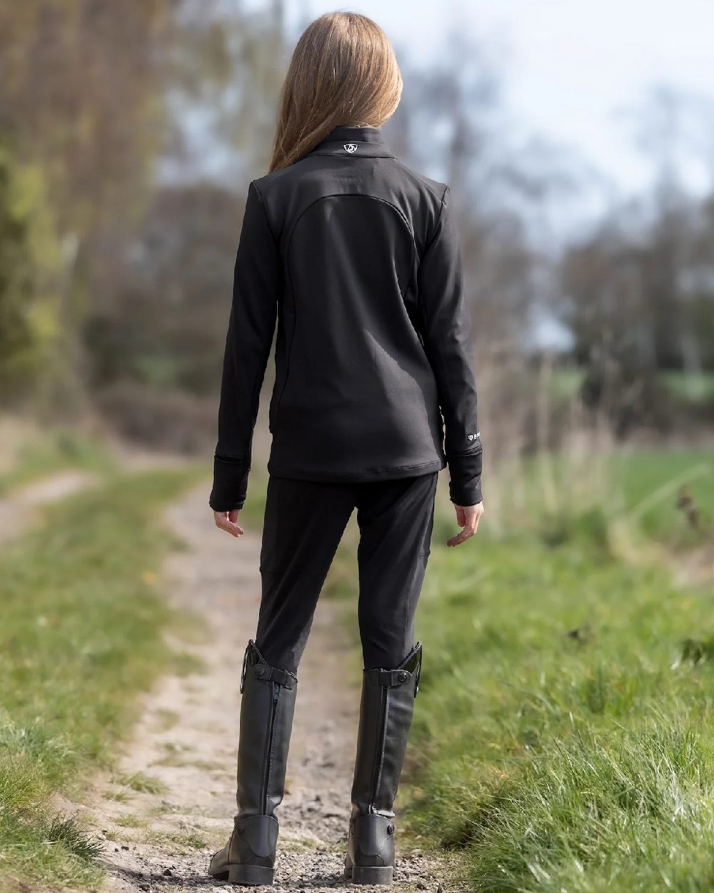 Brown White Coloured Equidry Childrens Water Repellent Knee Grip Leggings on outdoor background