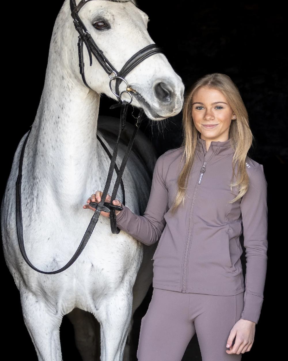 Mocha White Coloured Equidry Childrens Water Repellent Zip Up Top on outdoor background