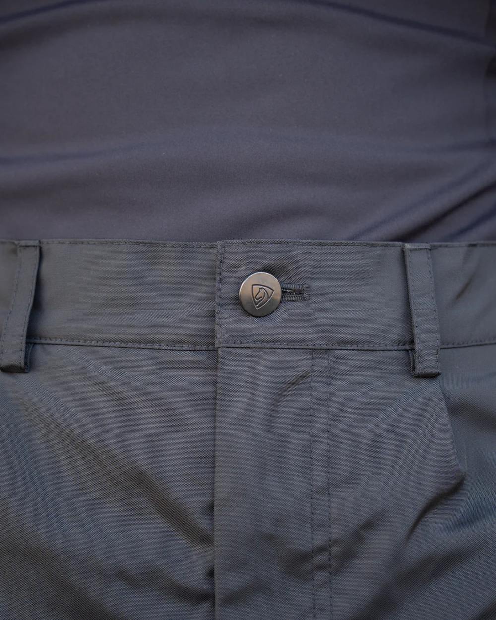 Black coloured Equidry Mens Fleece Lined Waterproof Trousers on outdoor background