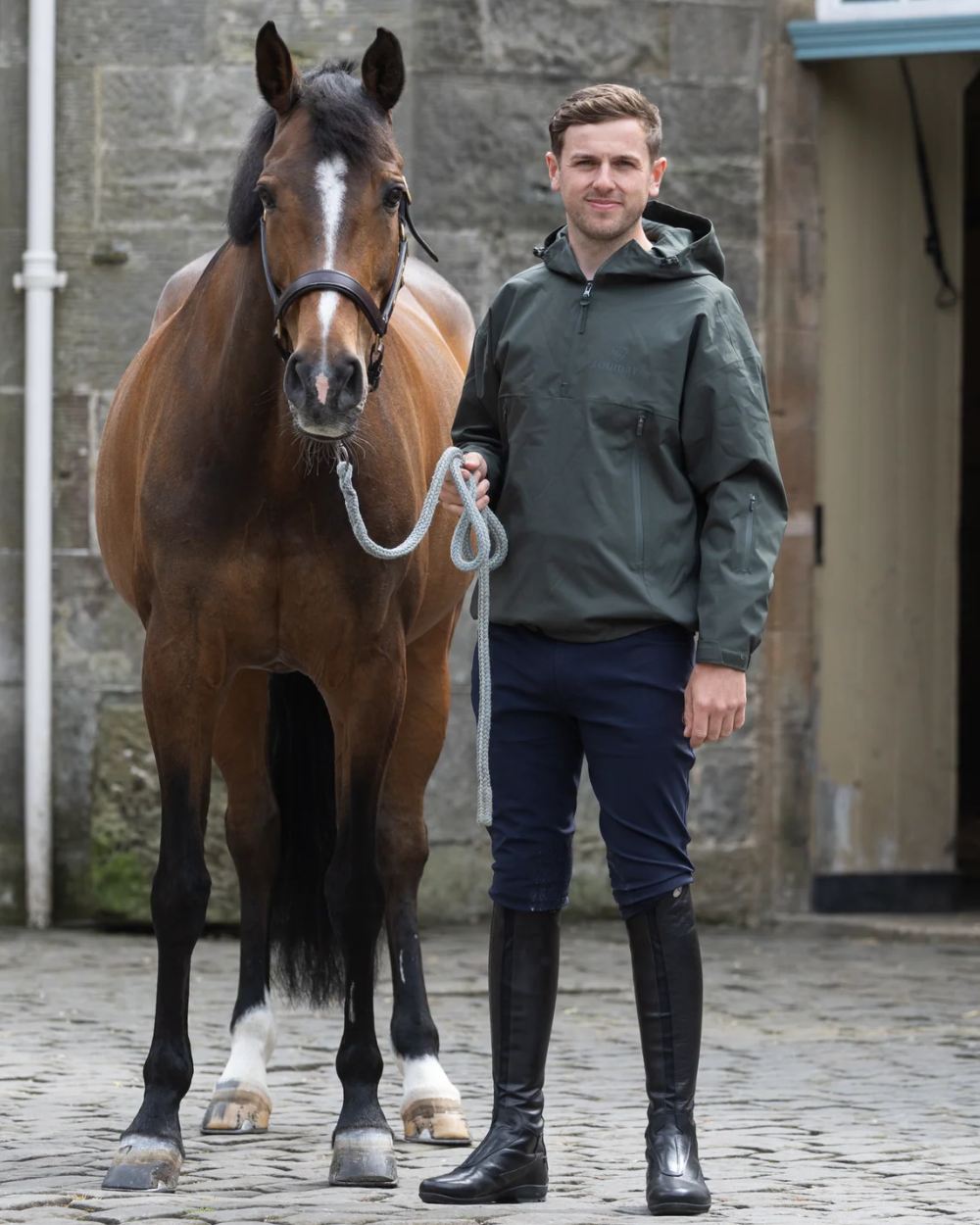 Black Forest Green coloured Equidry Mens Storm Smock With Velour Lining on outdoor background