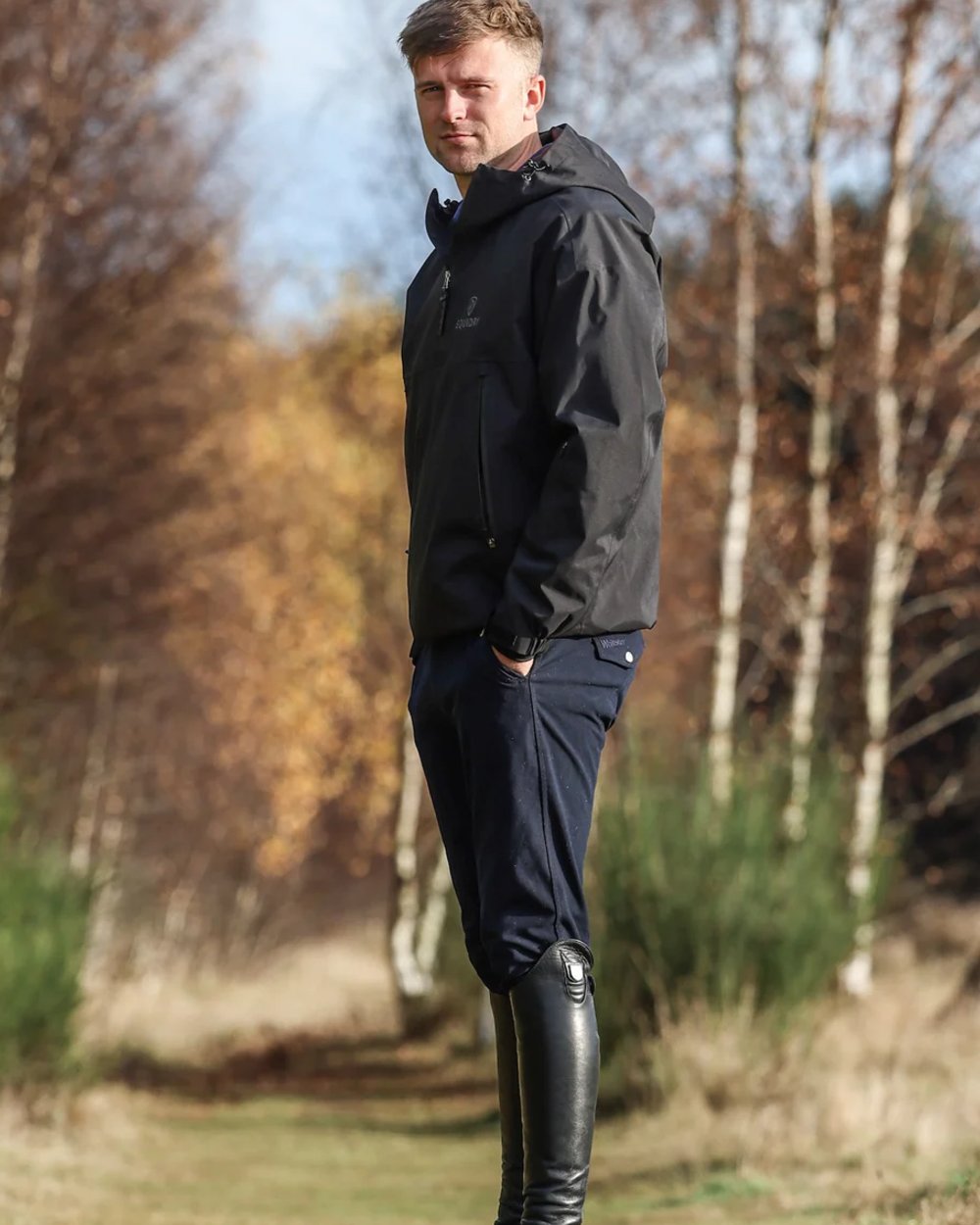 Black coloured Equidry Mens Storm Smock With Velour Lining on outdoor background