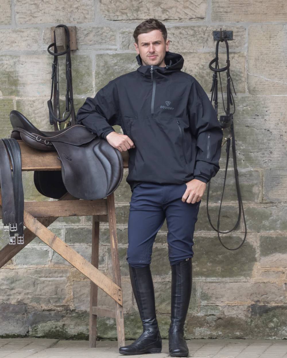 Black coloured Equidry Mens Storm Smock With Velour Lining on outdoor background