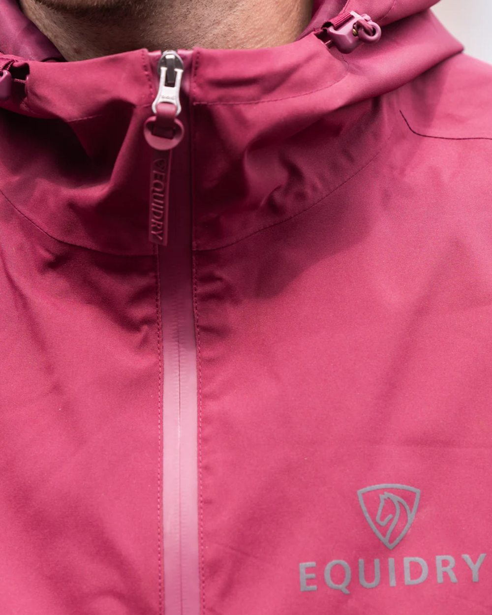 Plum coloured Equidry Mens Storm Smock With Velour Lining on outdoor background