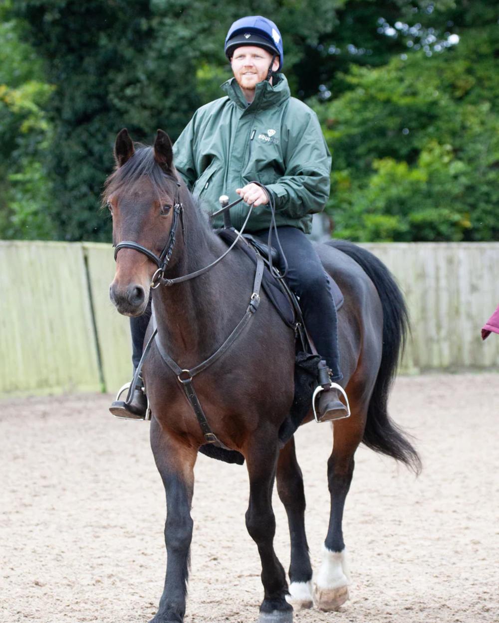 Black Forest Green coloured Equidry Mens Thin Fleece Shortie Jacket With Stowaway Hood on outdoor background