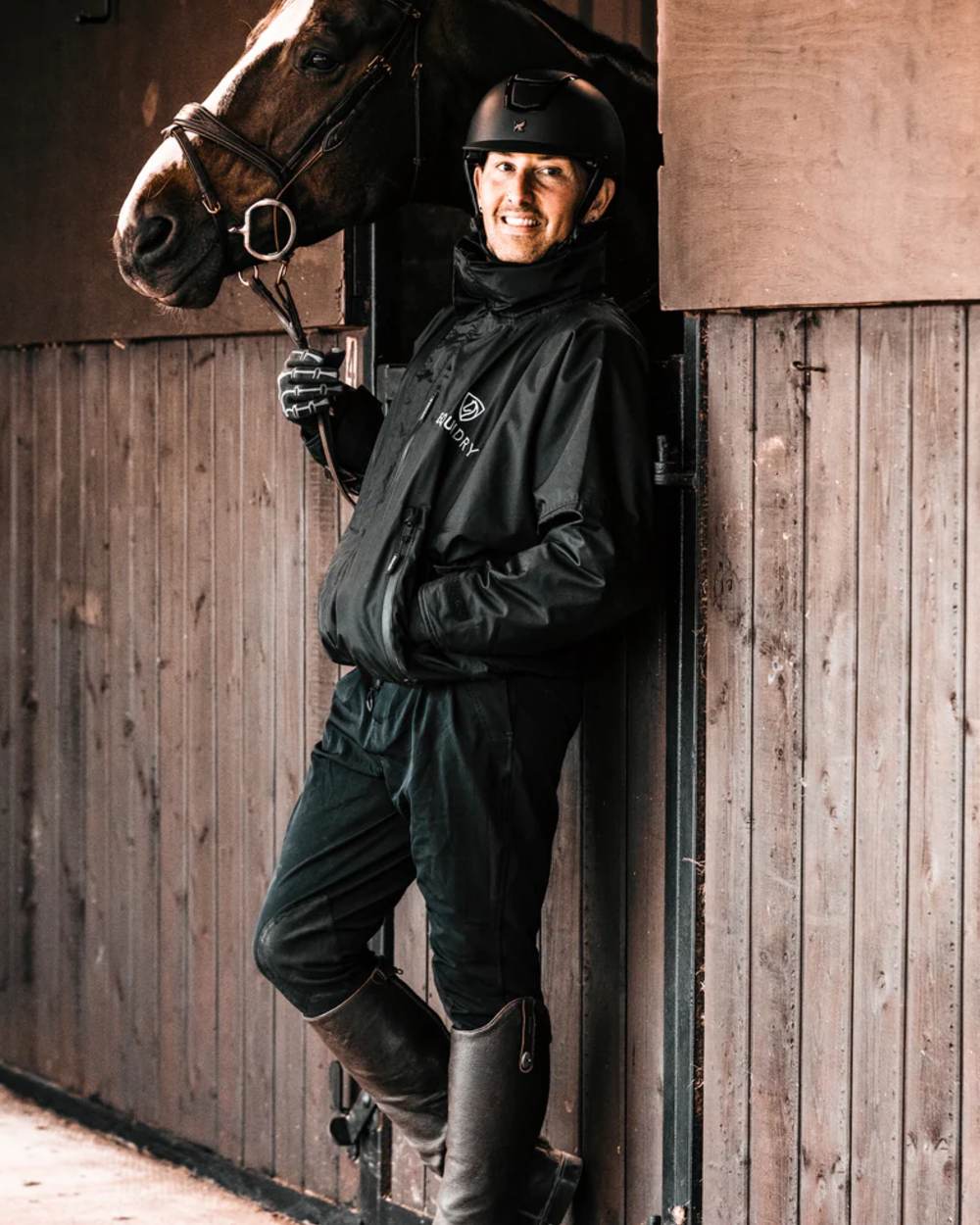 Black coloured Equidry Mens Thin Fleece Shortie Jacket With Stowaway Hood on outdoor background