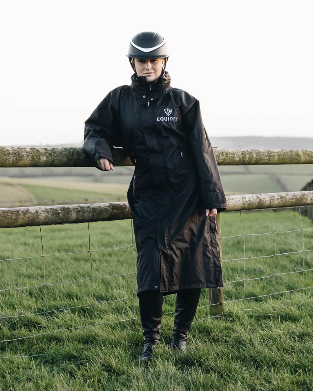 Black coloured Equidry Womens Equimac Evolution Jacket on farm background
