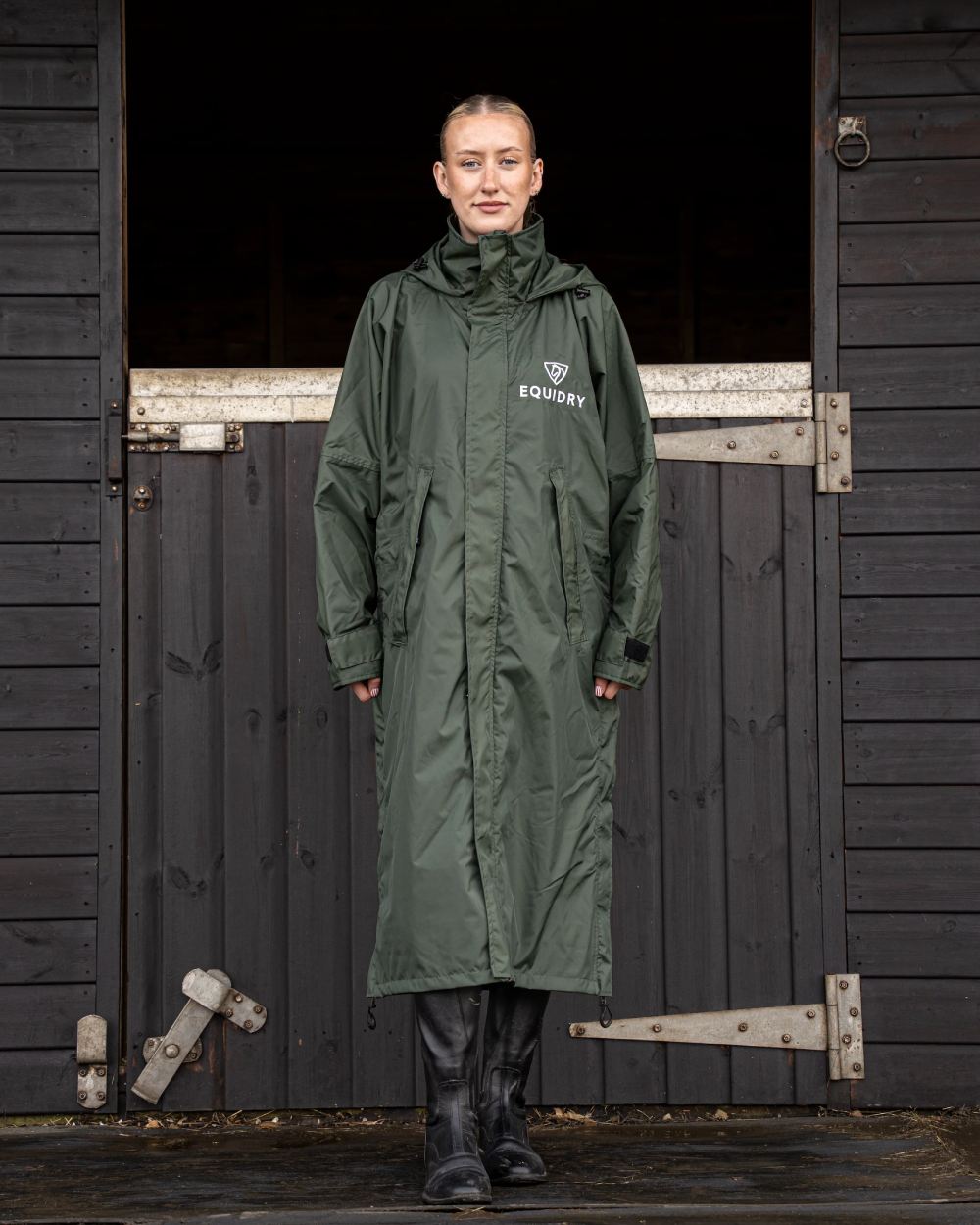 Black Forest Green coloured Equidry Womens Equimac Evolution Jacket on stable background