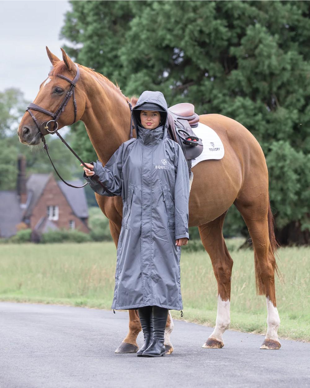 Charcoal Grey coloured Equidry Womens Equimac Evolution Jacket on street background