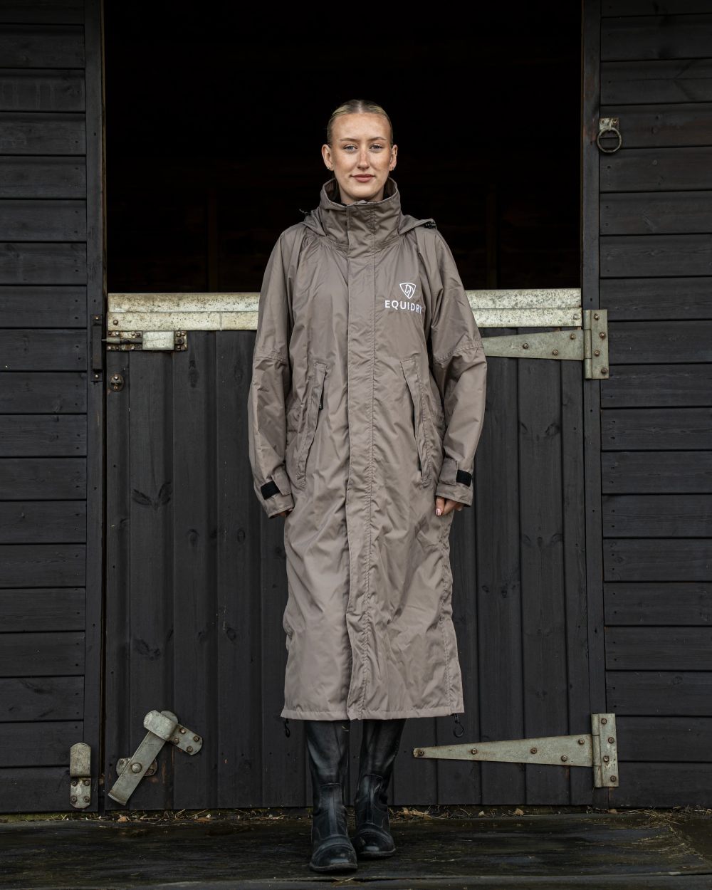 Mocha coloured Equidry Womens Equimac Evolution Jacket on Stable background