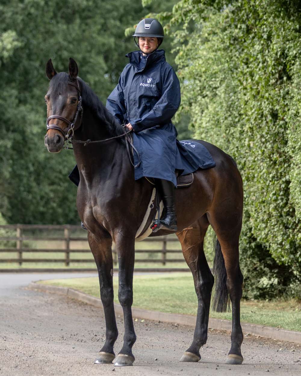 Dark Navy coloured Equidry Womens Equimac Evolution Jacket on farm background