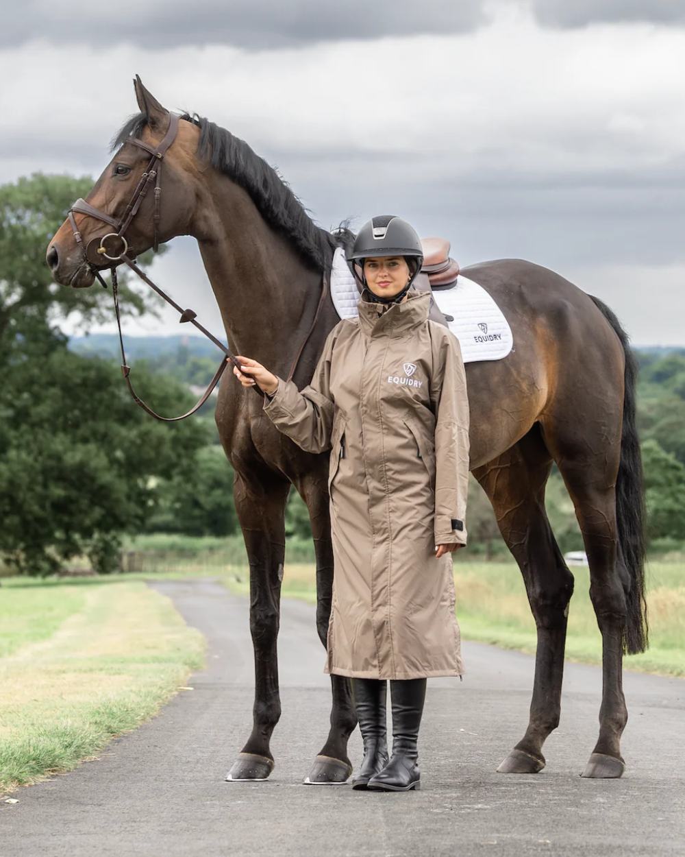 Taupe coloured Equidry Womens Equimac Evolution Jacket on Street background