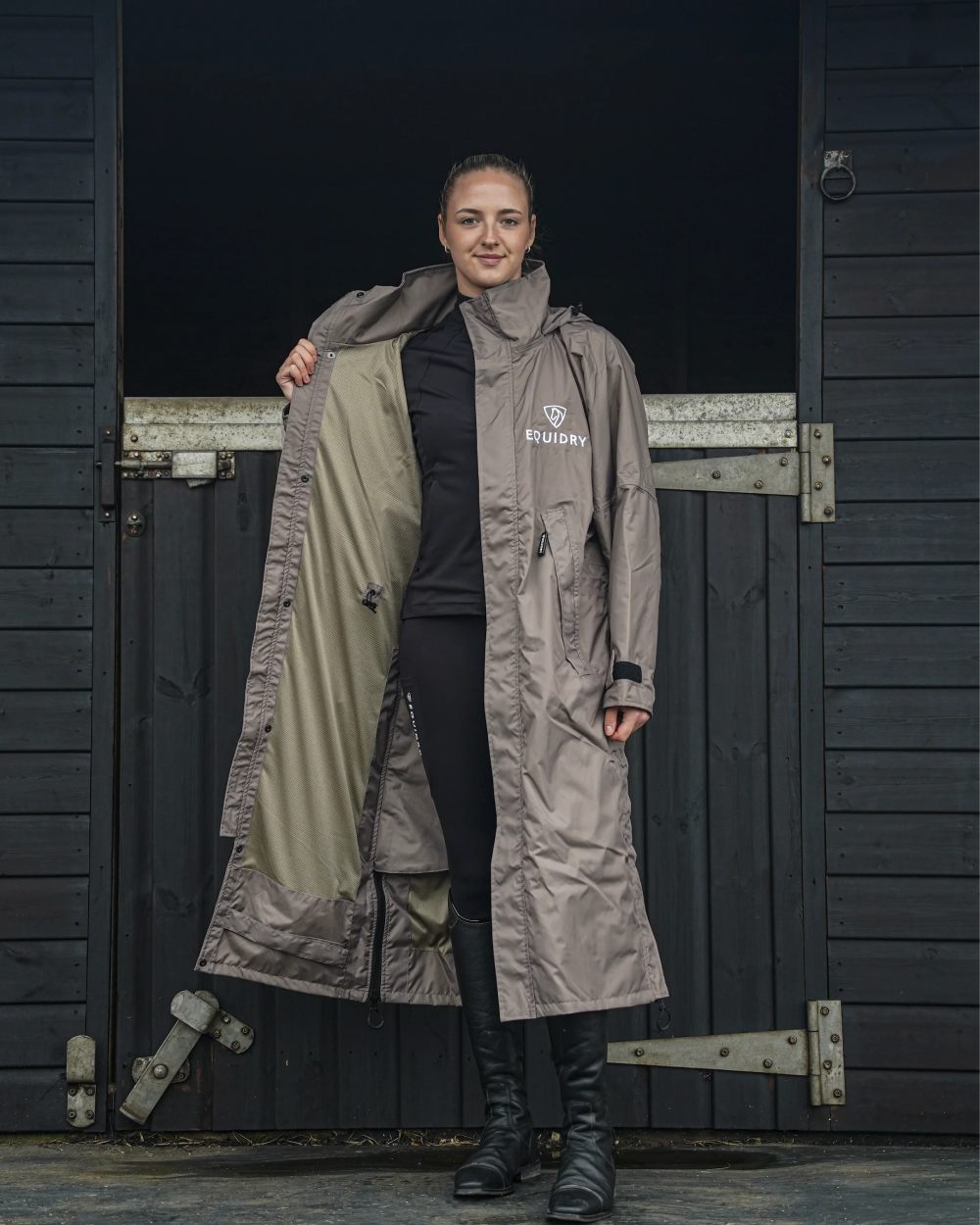 Taupe coloured Equidry Womens Equimac Evolution Jacket on stable background