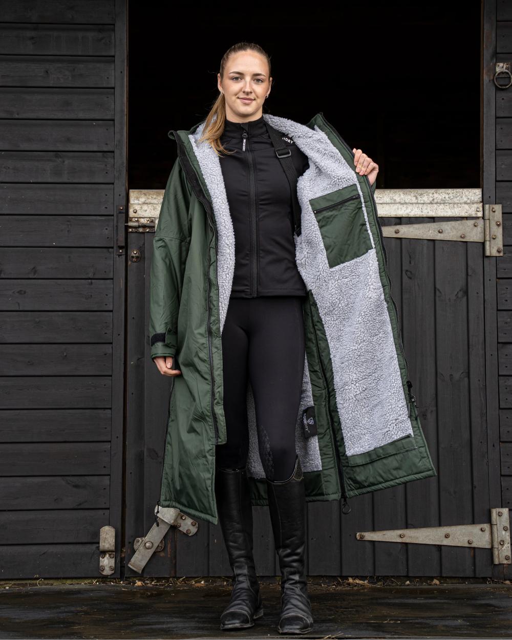 Black Forest Green coloured Equidry Womens Original All Rounder Waterproof Coat on outdoor background