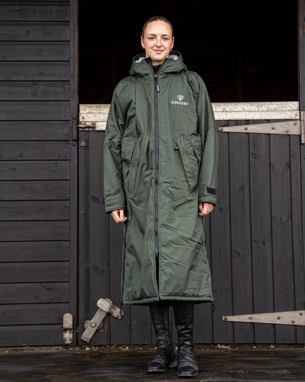 Black Forest Green coloured Equidry Womens Original All Rounder Waterproof Coat on outdoor background