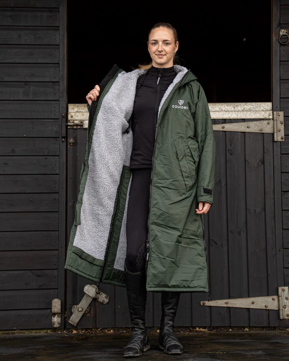 Black Forest Green coloured Equidry Womens Original All Rounder Waterproof Coat on outdoor background