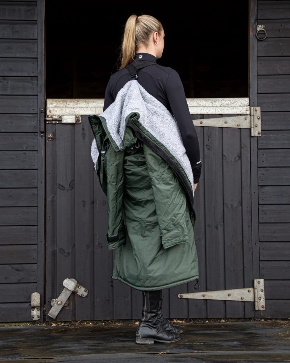 Black Forest Green coloured Equidry Womens Original All Rounder Waterproof Coat on outdoor background