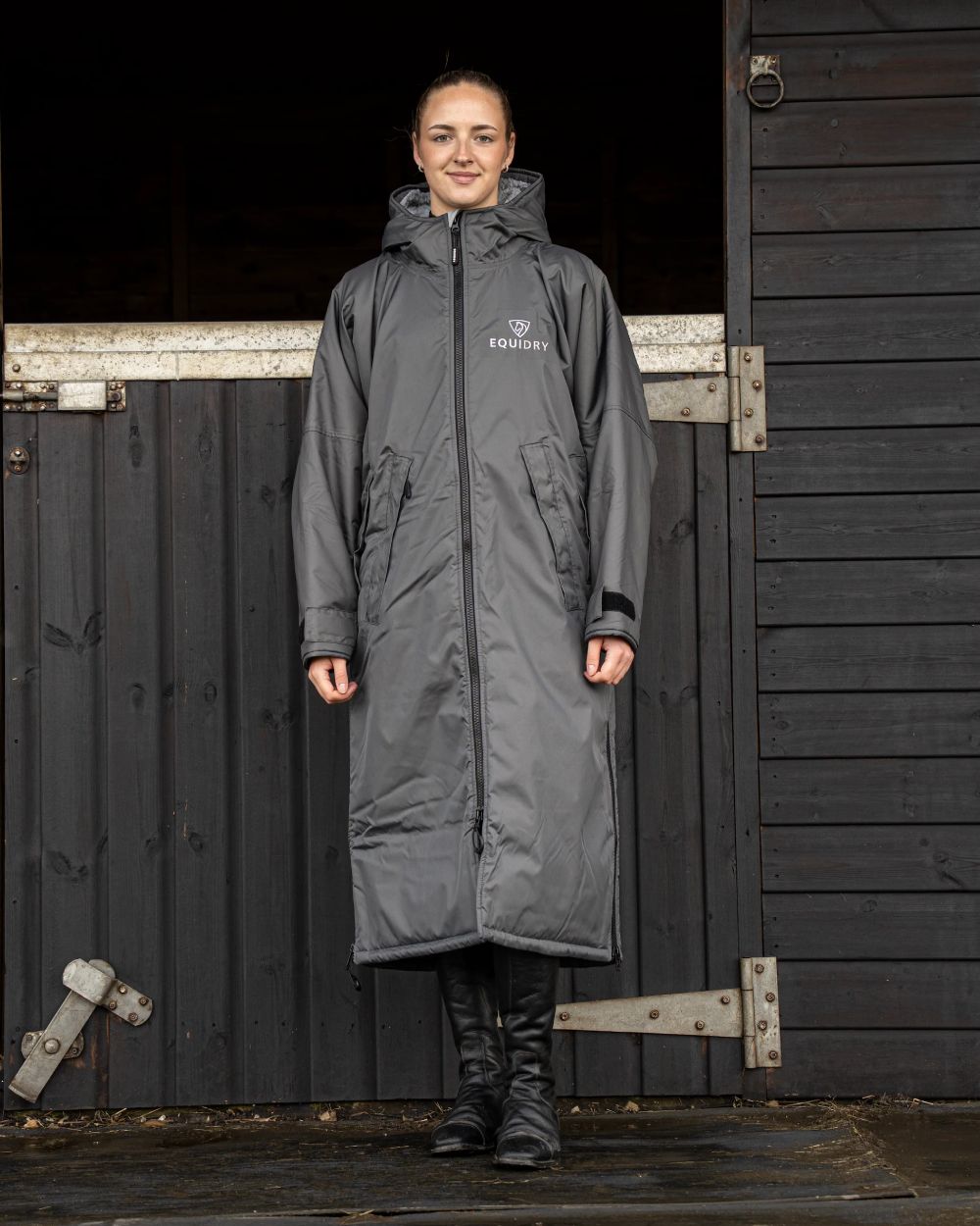Charcoal Grey coloured Equidry Womens Original All Rounder Waterproof Coat on outdoor background