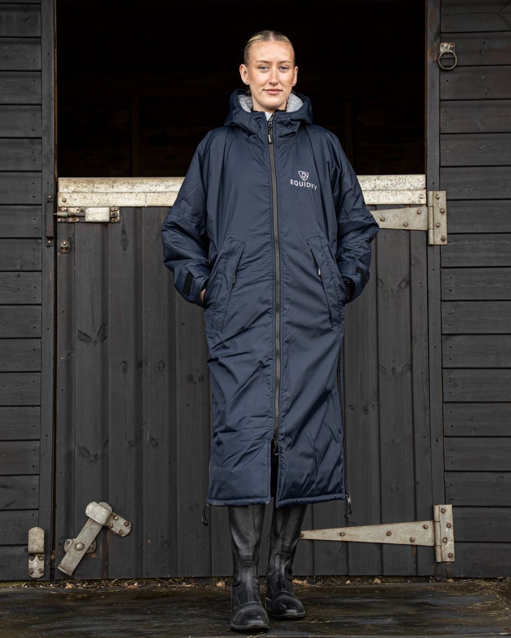 Navy Grey coloured Equidry Womens Original All Rounder Waterproof Coat on outdoor background