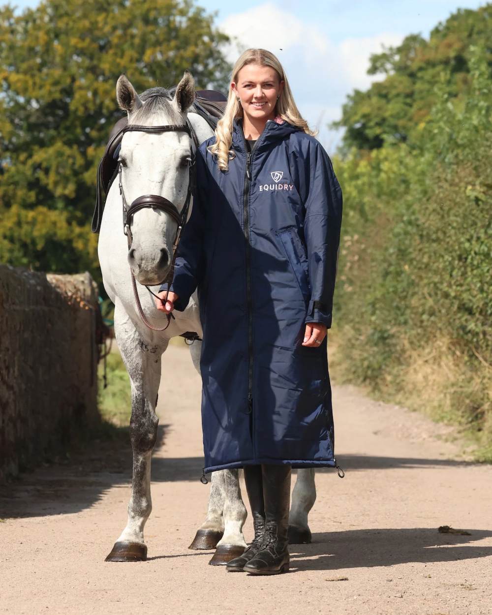 Navy Pale Pink coloured Equidry Womens Original All Rounder Waterproof Coat on outdoor background