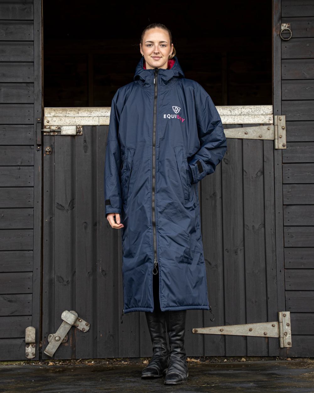 Navy Raspberry coloured Equidry Womens Original All Rounder Waterproof Coat on outdoor background