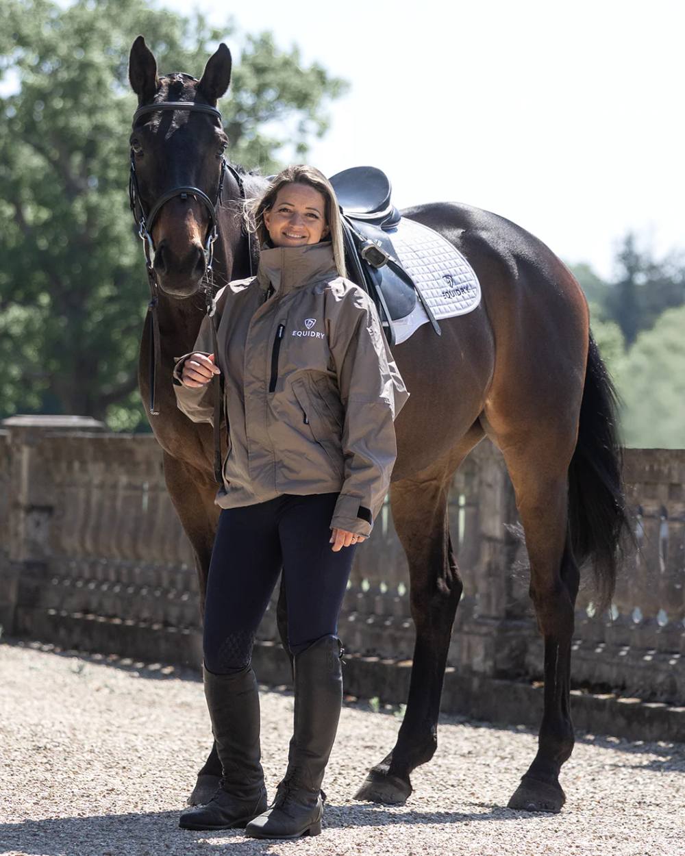 Taupe coloured Equidry Womens Shortie Mesh Lining Mac on stable background