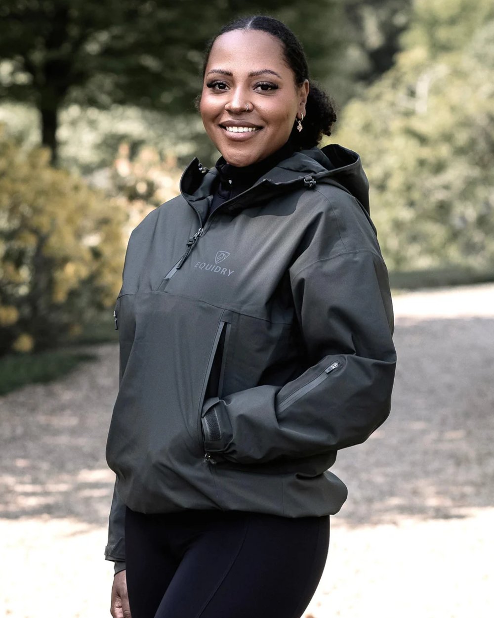 Black Forest Green coloured Equidry Womens Storm Smock With Velour Lining on outdoor background