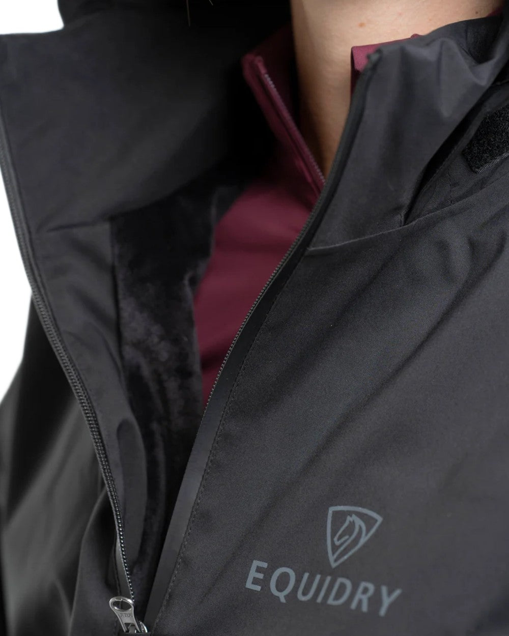 Black coloured Equidry Womens Storm Smock With Velour Lining on white background