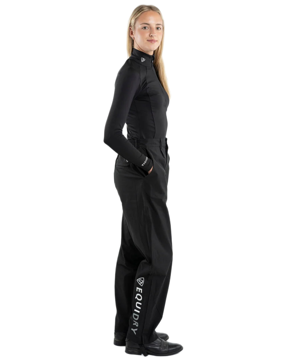 Black coloured Equidry Womens Unlined Waterproof Trousers on white background