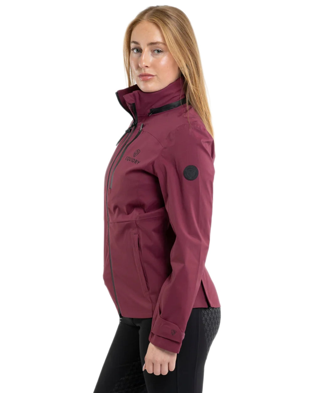 Plum coloured Equidry Womens Varsha Jacket with Stowaway Hood on white background