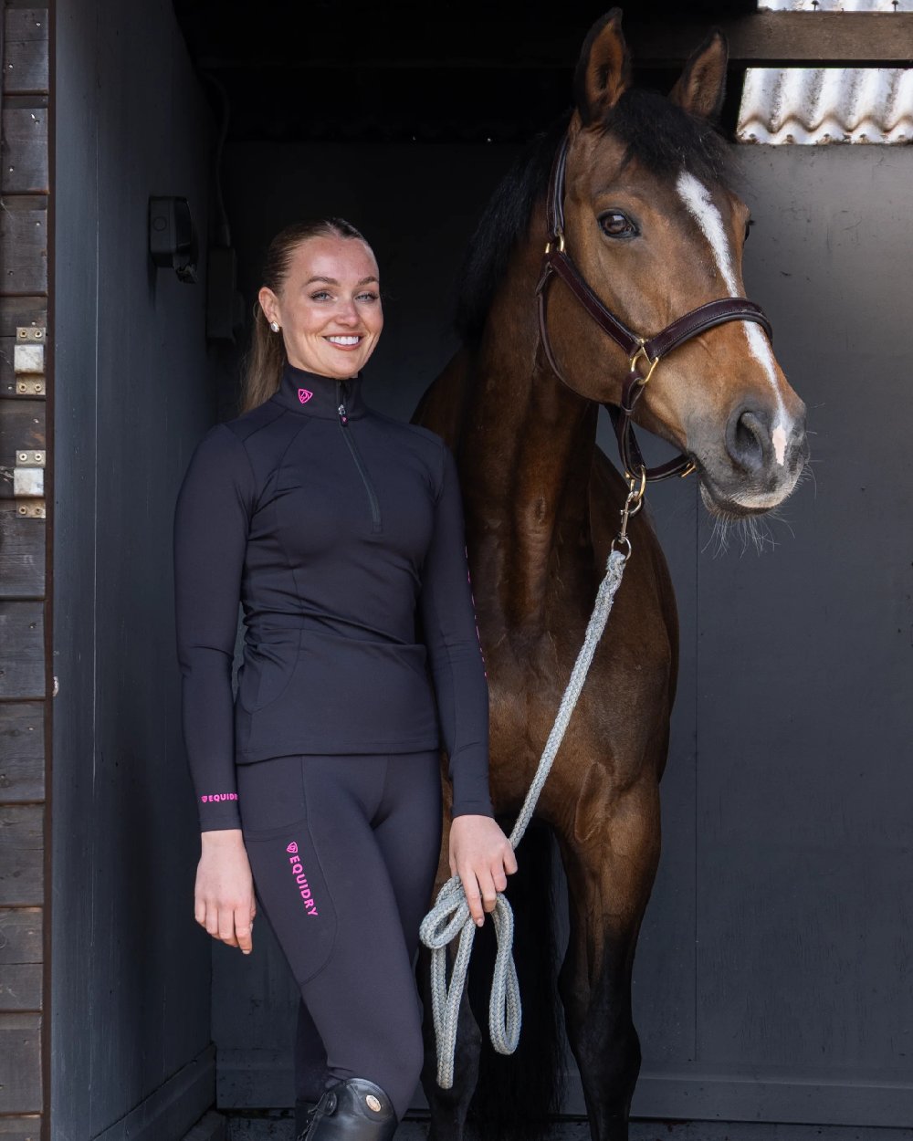 Black Peacock Pink Coloured Equidry Womens Water Repellent Base Layer on outdoor background