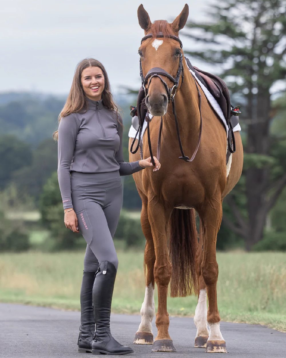 Grey Pale Pink Coloured Equidry Womens Water Repellent Base Layer on outdoor background