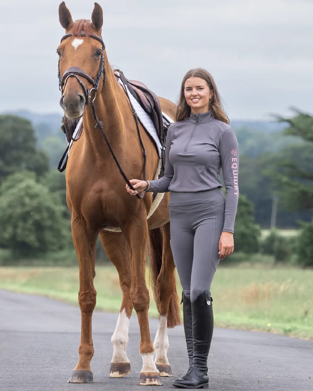 Grey Pale Pink Coloured Equidry Womens Water Repellent Base Layer on outdoor background