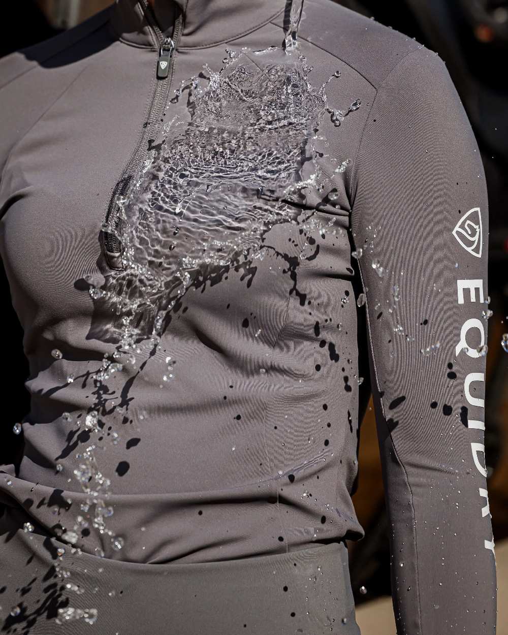 Grey White Coloured Equidry Womens Water Repellent Base Layer on outdoor background