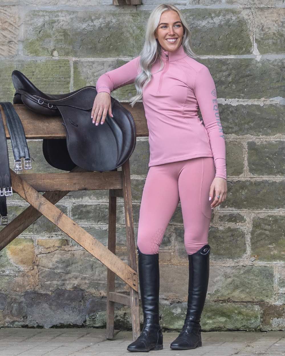 Pale Pink Grey Coloured Equidry Womens Water Repellent Base Layer on outdoor background