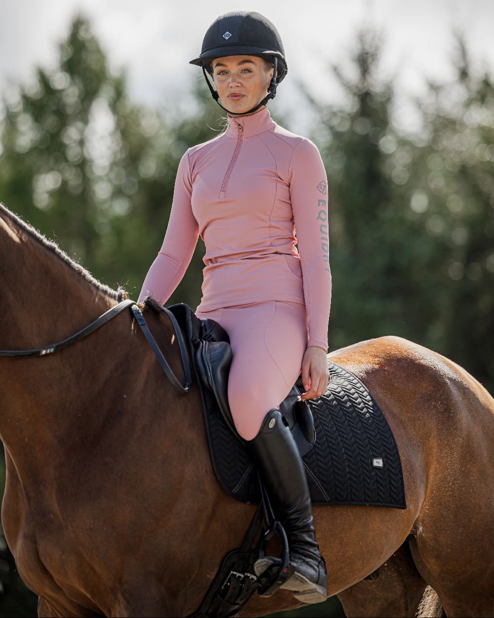 Pale Pink Grey Coloured Equidry Womens Water Repellent Base Layer on outdoor background