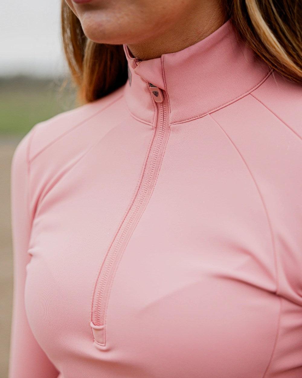 Pale Pink Grey Coloured Equidry Womens Water Repellent Base Layer on outdoor background